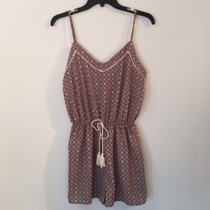 Peach and blue pattern romper.